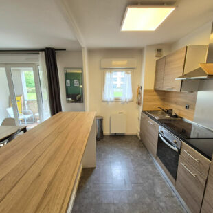 APPARTEMENT DE TYPE 2 AVEC TERRASSE, CAVE ET PARKING