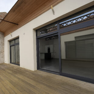 LOFT 118 m² AVEC TERRASSE ET PARKING