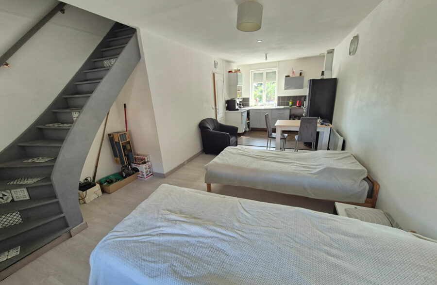 Immeuble de rapport avec local commercial et appartement loué