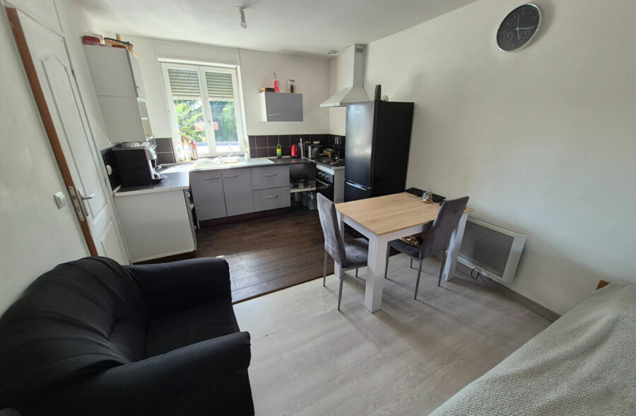 Immeuble de rapport avec local commercial et appartement loué
