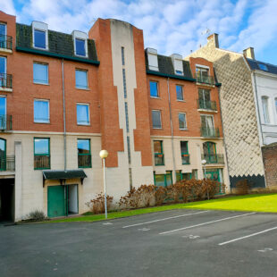 A deux pas du Centre Ville et de la gare, appartement 7 pièces avec 4 garages, 5 caves et une place de parking