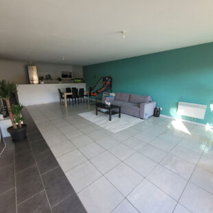 Immeuble comprenant 4 logements et un local commercial