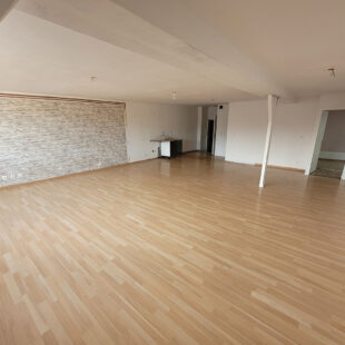 Immeuble comprenant 4 logements et un local commercial