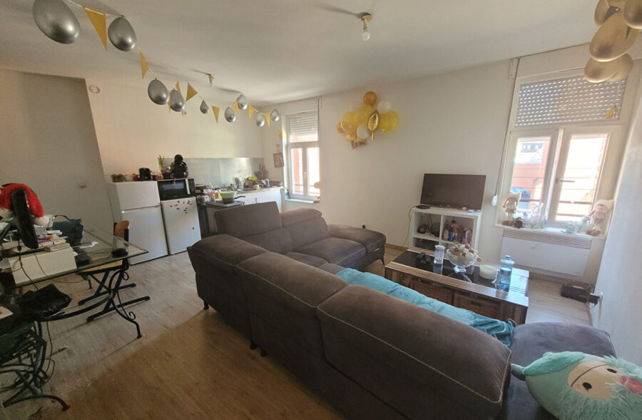 Immeuble comprenant 4 logements et un local commercial