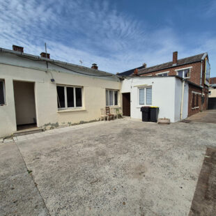 immeuble de rapport – 240 m² habitables avec cour, garage et terrain