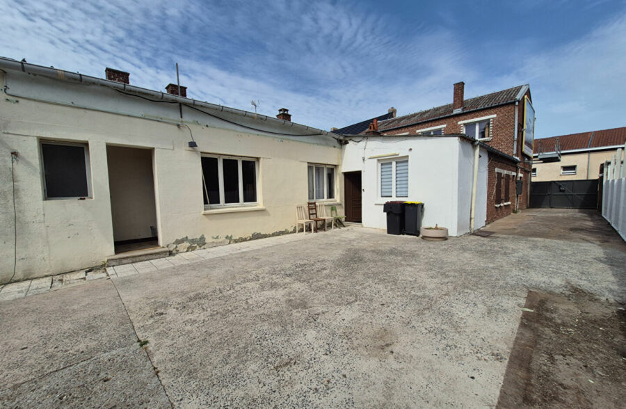 immeuble de rapport – 240 m² habitables avec cour, garage et terrain