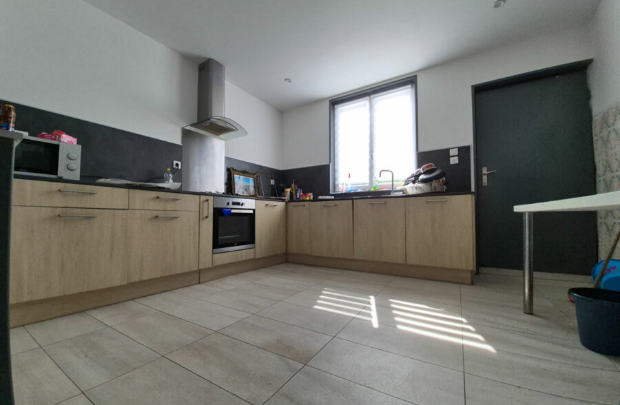 immeuble de rapport – 240 m² habitables avec cour, garage et terrain