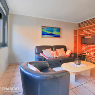 Maison 110 m² et garage.