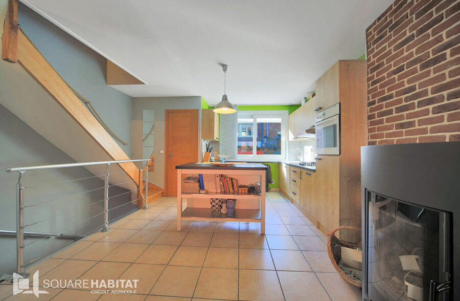 Maison 110 m² et garage.