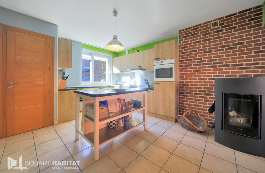 Maison 110 m² et garage.