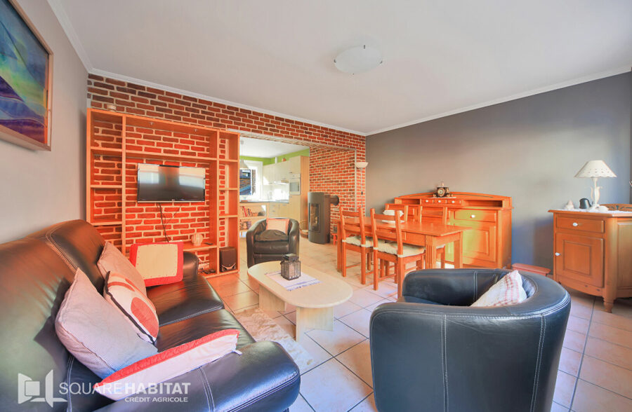 Maison 110 m² et garage.