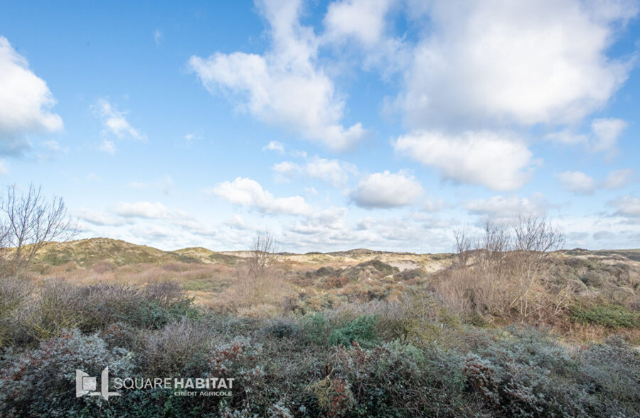 “Superbe T2 lumineux avec balcon et vue sur les dunes”