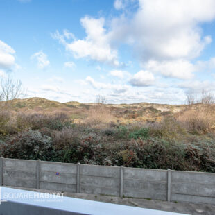 “Superbe T2 lumineux avec balcon et vue sur les dunes”